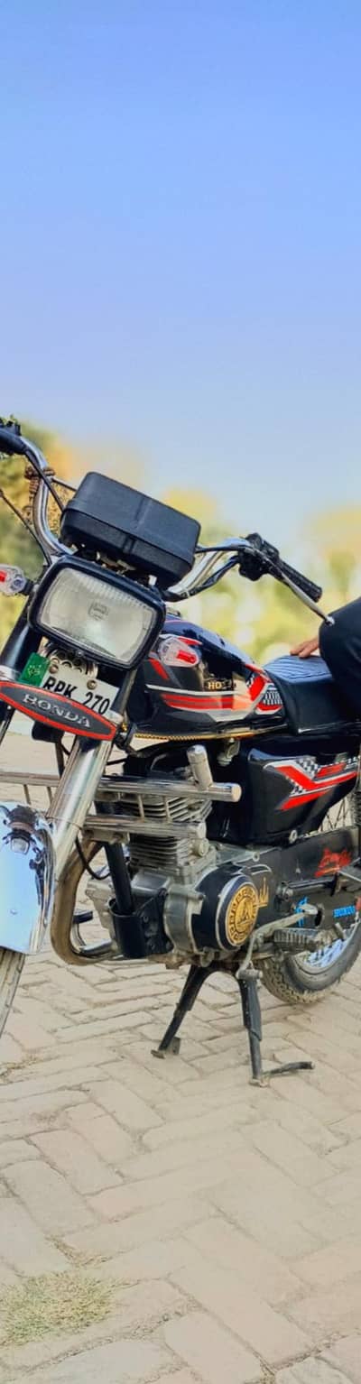 Honda 125 h 12 model rajunpur ka nmbr h