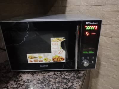 Dawlance microwave neat and clean 100% working
