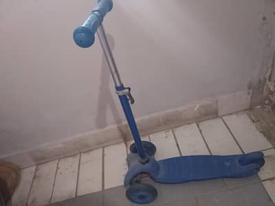 Blue Scootie. lights on when ride