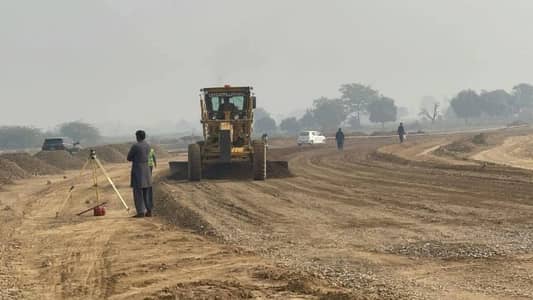 5 MARLA POSSESSION PLOT IN C ALL DUES CLEAR ROAD Level NO DP NO POLE