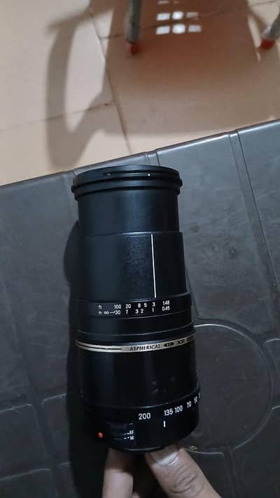 Canon D-700 with lense  18-200MM