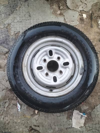 size 12.  one tyre only with rim ( WhatsApp 03365543699)