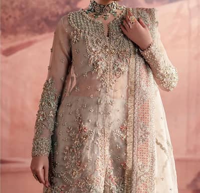 aik long dress hy or doosra shirt sharara hy size medium hy