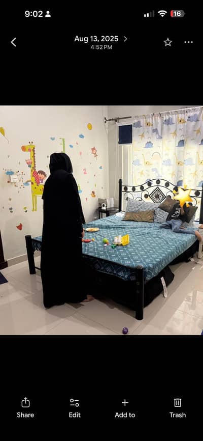 Iron bed with a mattress in perfect condition