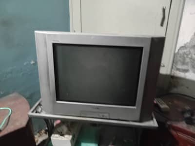 tv, sofa set and dressing table