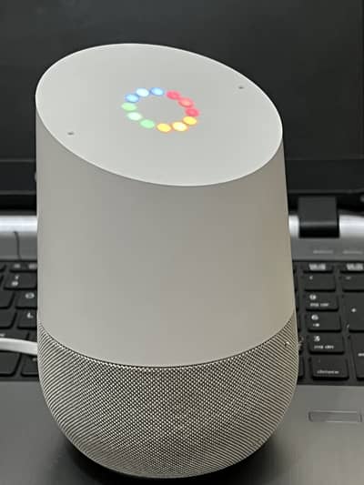 Google Home speaker + Assistant