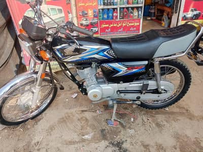 Honda 125 Totally Genion price Rs 215000