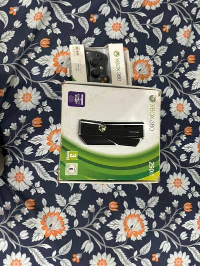 xbox 360 with 2 controllers and 10 games installed
