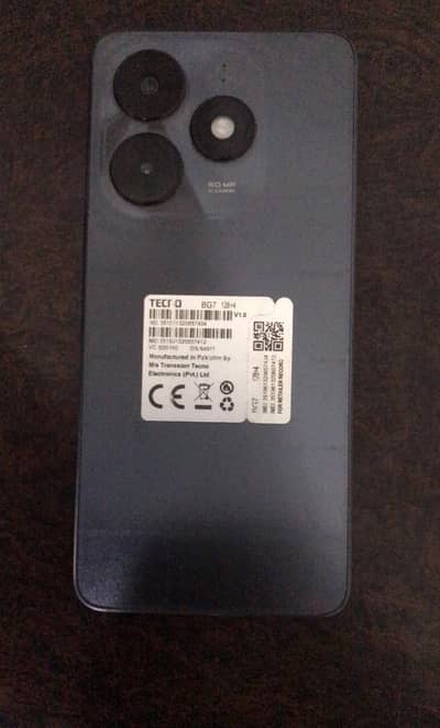 with box and charger