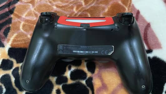 PS4 for sale with spider man skin and controller