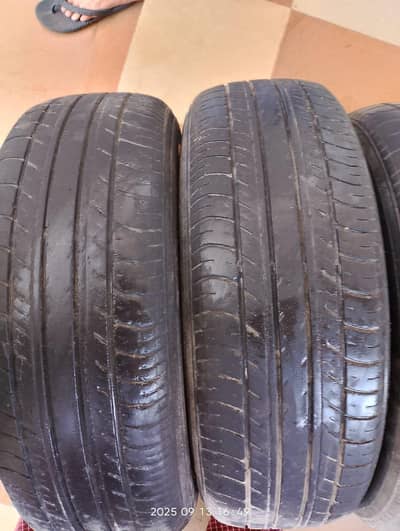 4 Yokohama tyre tubeless size 185-65-15, 3 Tyres in good 1 is normal.