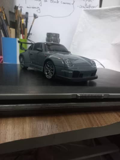 10/10 condition 1 month used porsche drift car with racing wheels