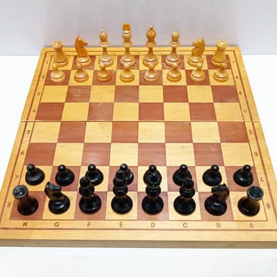 Vintage Russian Wooden Detailed Chess Set with a Folding Wooden Board