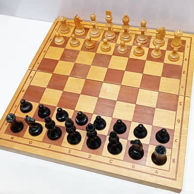 Vintage Russian Wooden Detailed Chess Set with a Folding Wooden Board