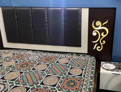 good condition plai wood bed without mattress