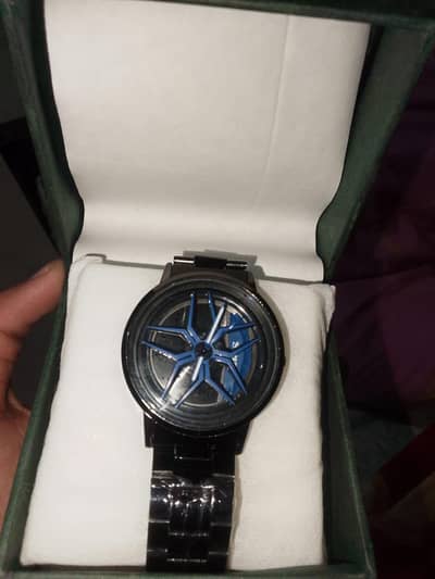 Rim spinner watch