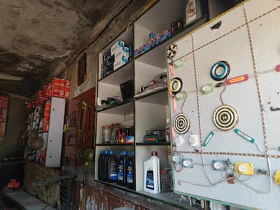 bike repairing shop with spare parts and tools 03107620362 watts app