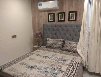 700 Square Feet Spacious Flat Available In Bahria Town - Sector E For sale