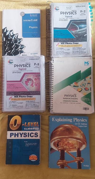 IGCSE physics book with past papers and some extra physics books