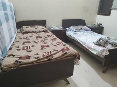 2 single beds and 1 wardrobe