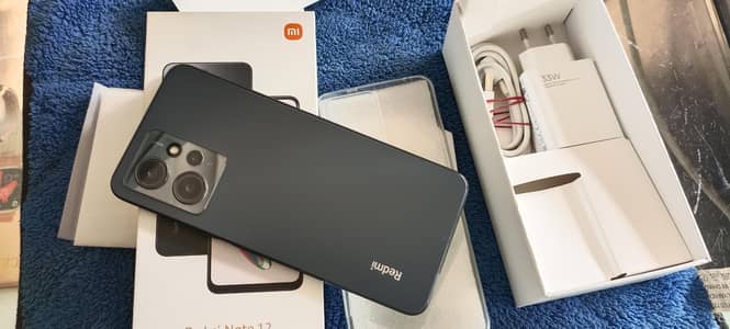 8+4gb Ram 128Gb Rom. 10 by 10 with box charger Sab available ha