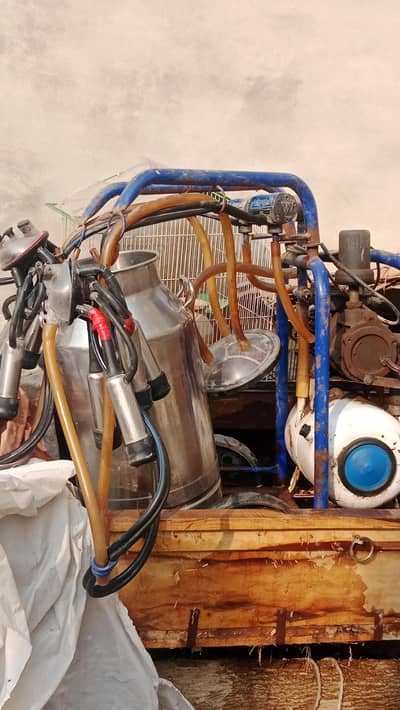 cows ka dhoodh nilklany wali electric machine complete double set