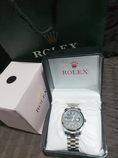Rolex silver/golden   Rado  Black-silver