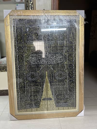 Woden golden frame multazim black and golden work new he bilkul