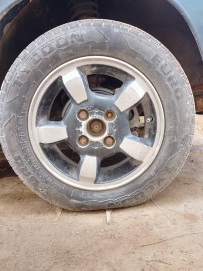 very good condition 13" Rim.  Japanese  03213820200. With Tyre