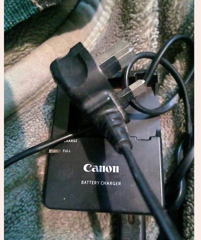 Canon 700D with 70_300 mm lens charger and bag what's 03011235588