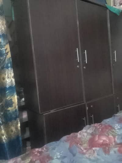 used wooden brown room wardrobe