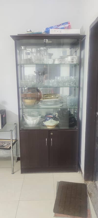 crockery storage and glass table