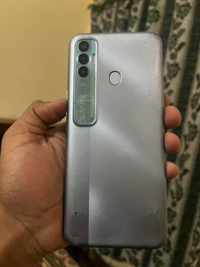 Tecno spark 7 pro    With dubaa charger   RAM4 /64