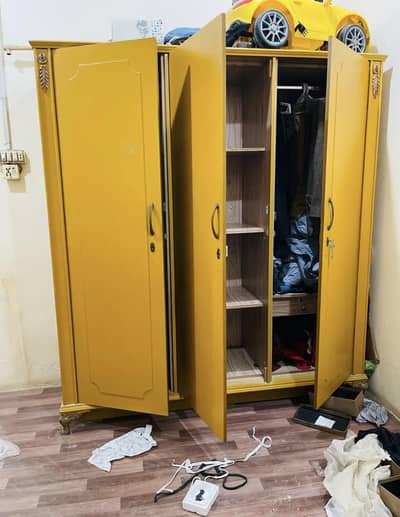 Bedroom Set: Bed + 2 sides tables + Dressing table + 3 Doors Wardrobe.