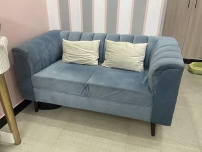 2 seater cushioned sofa