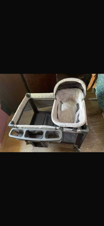 Baby playpen with bassinet and changing table