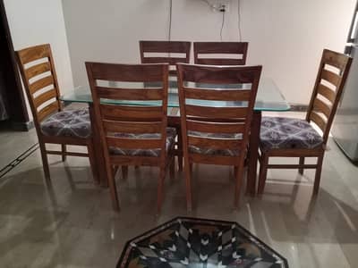 6 seater Dinning Table. 6 comfortable chairs and table.