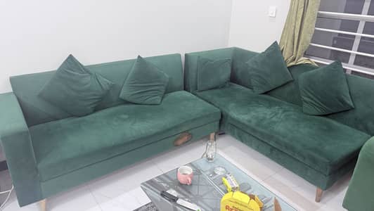 Green L shape sofa 1 year old
