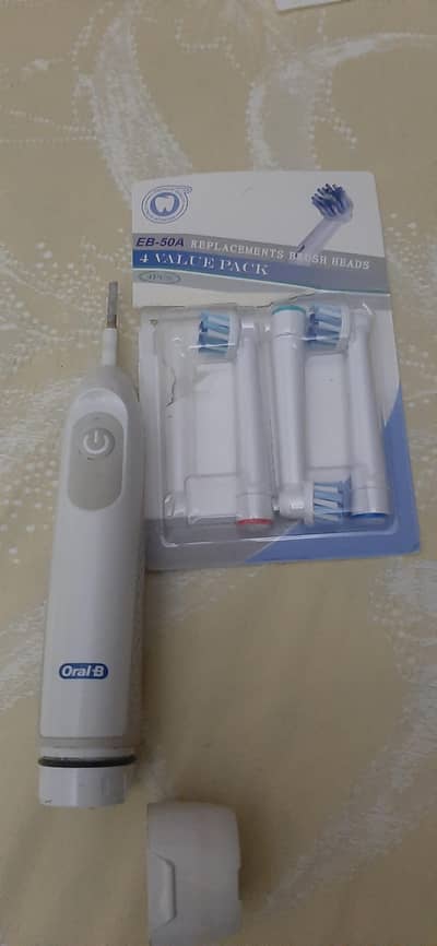 Oral Electric brush [with new 3 brush heads)