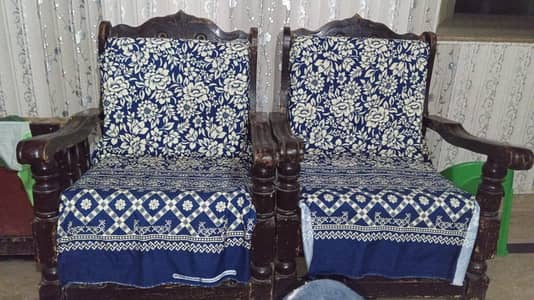 2 sofa chairs and 3 tables