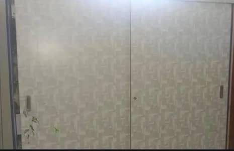 Almirah with sliding doors