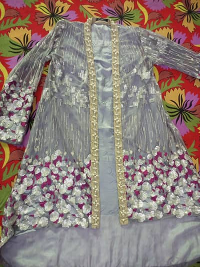 Ladies Gaoun in New Condition.