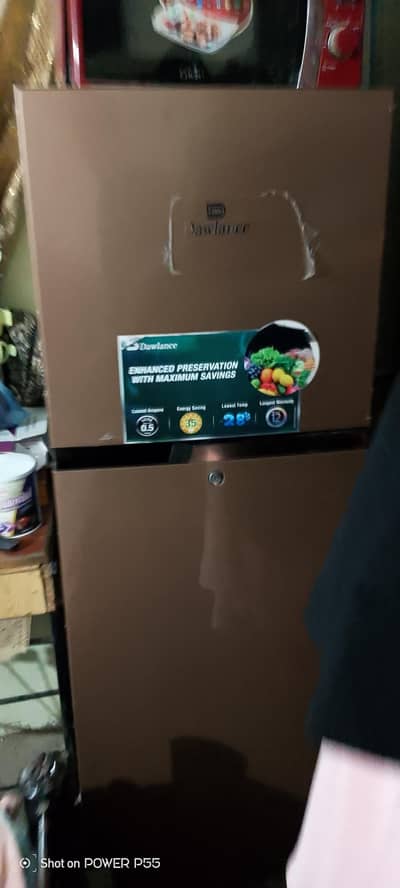 Dawlance fridge 5month use only 10by 10 buy and use it