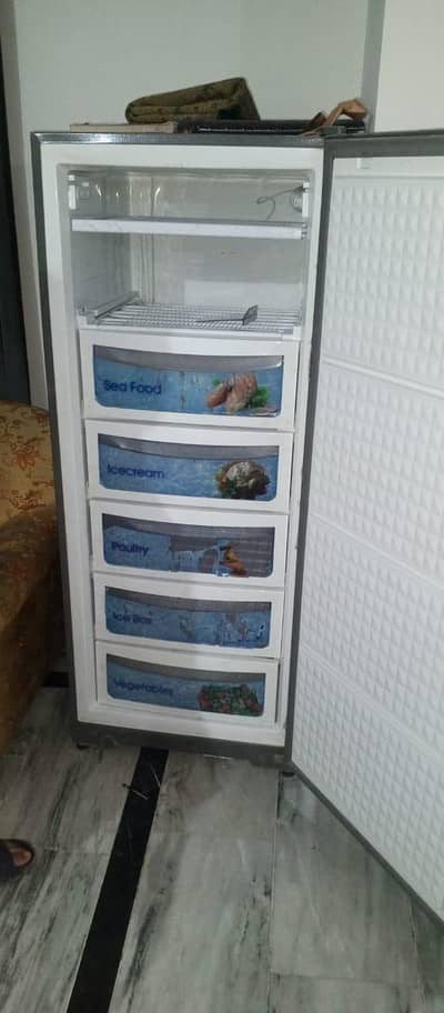 dawlance vertical deep freezer