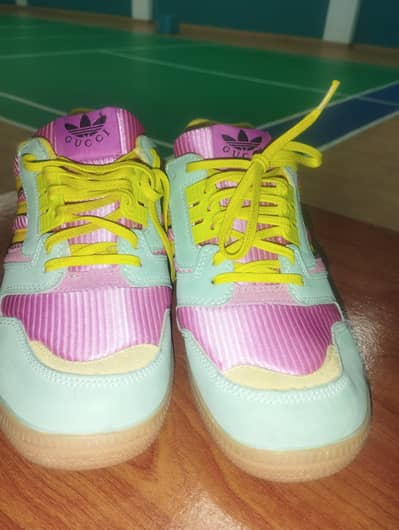 This is a pair Adidas X Gucci ZX sneakers for non marking