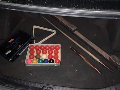 Snooker stick and balls