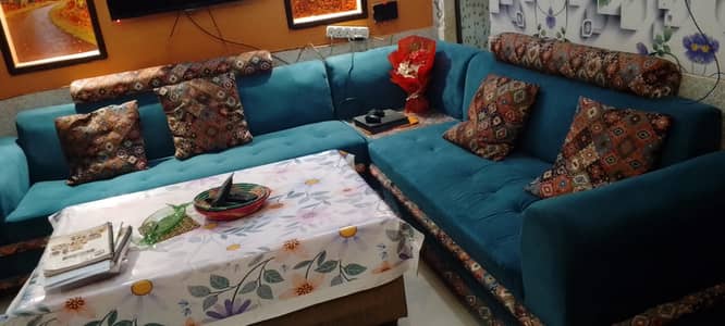 An elegant designed L shaped sofa, with corner.