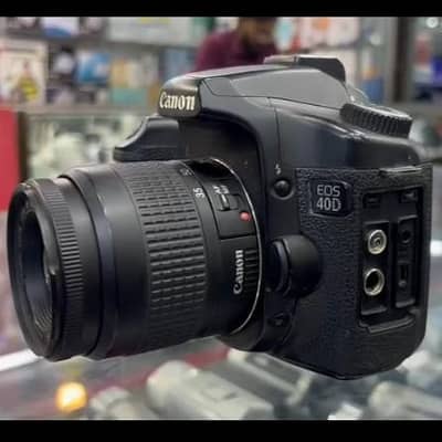Canon EOS 40D DSLR camera  with 35–80mm lens