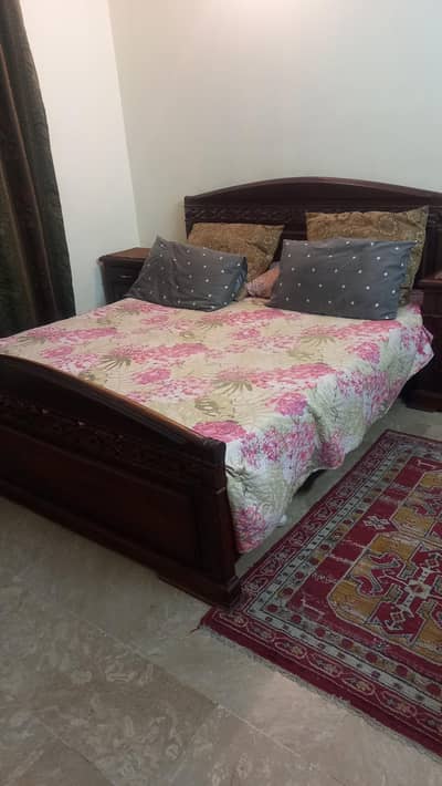 Queen size wooden bed for sale