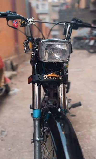 70cc bike (unique), first owner, karachi number just like new